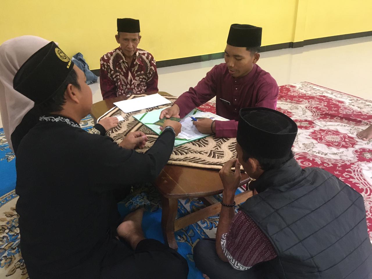 Sahkan Pasangan Asal Sungai Ulu, Penghulu KUA Bunguran Timur Pimpin Akad Nikah Zurhan dan Marlina