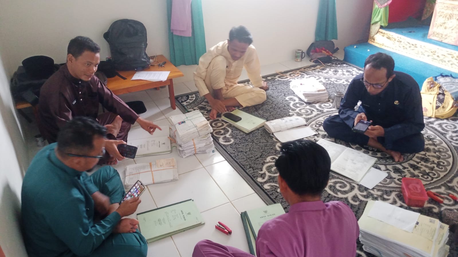 Dari Lemari Arsip ke Ruang Digital: Kepala KUA Pulau Tiga Percepat Transformasi Administrasi